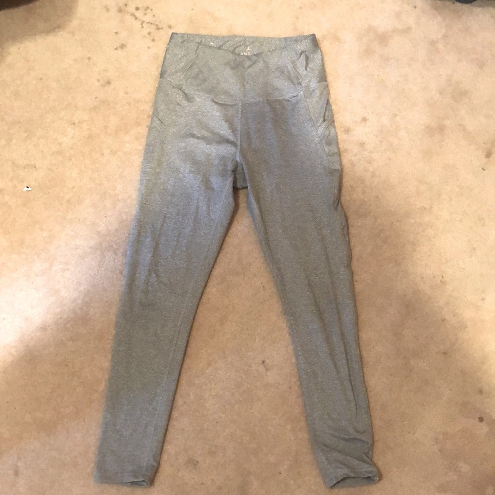 pair of Danskin black and white striped leggings size small.